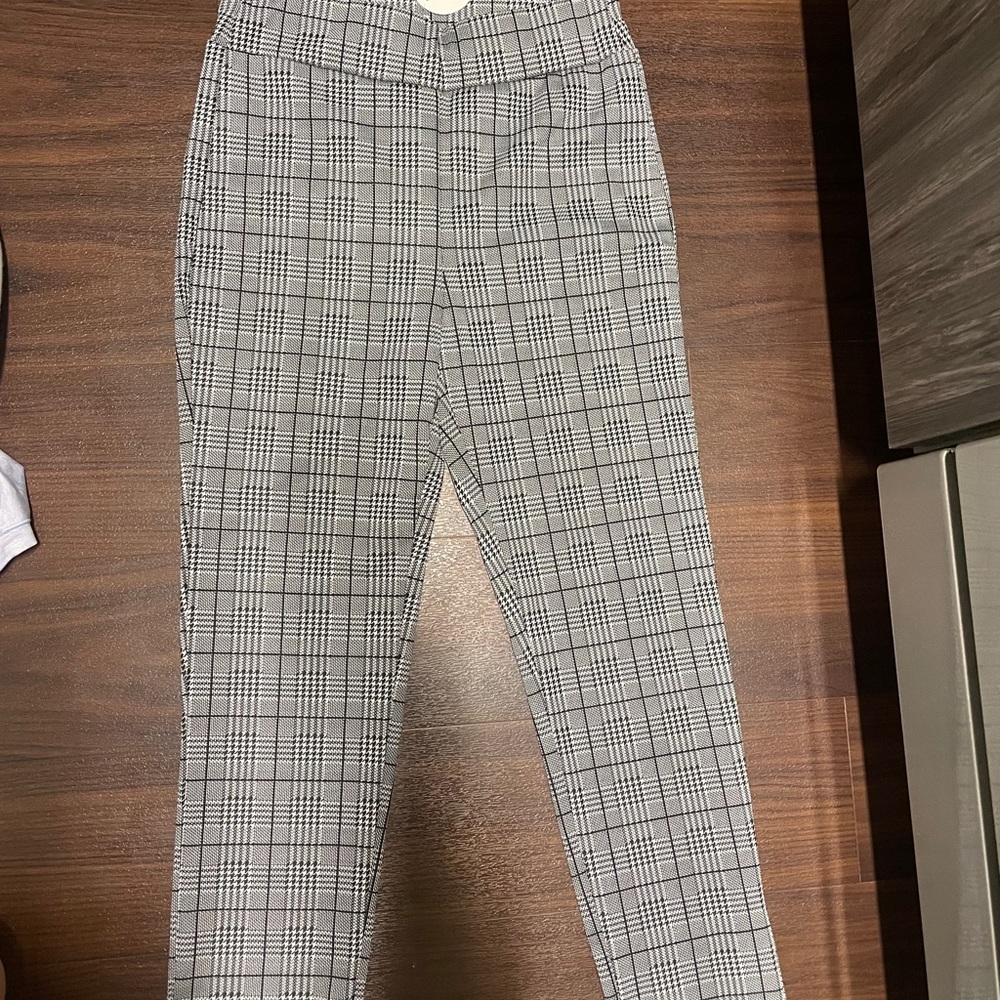Patterned black designed dress pants.